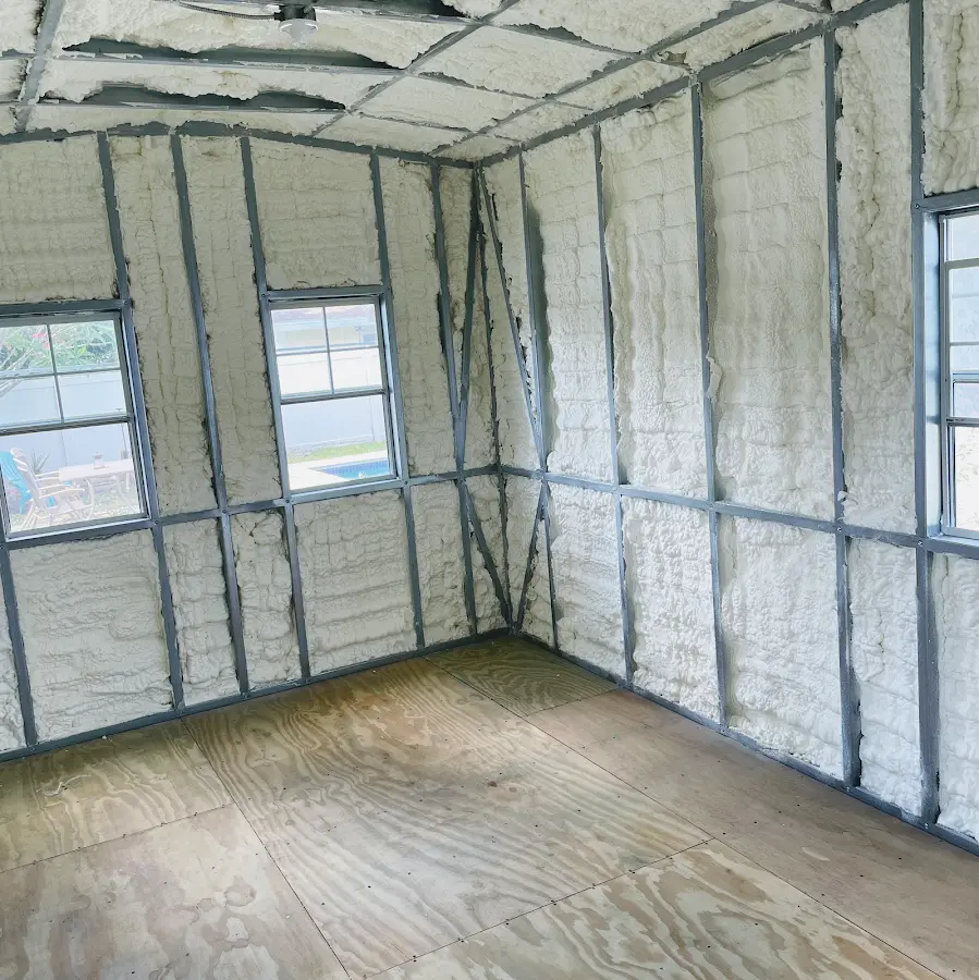 Closed-cell spray foam insulation applied to wall cavities in a residential project in Raceland